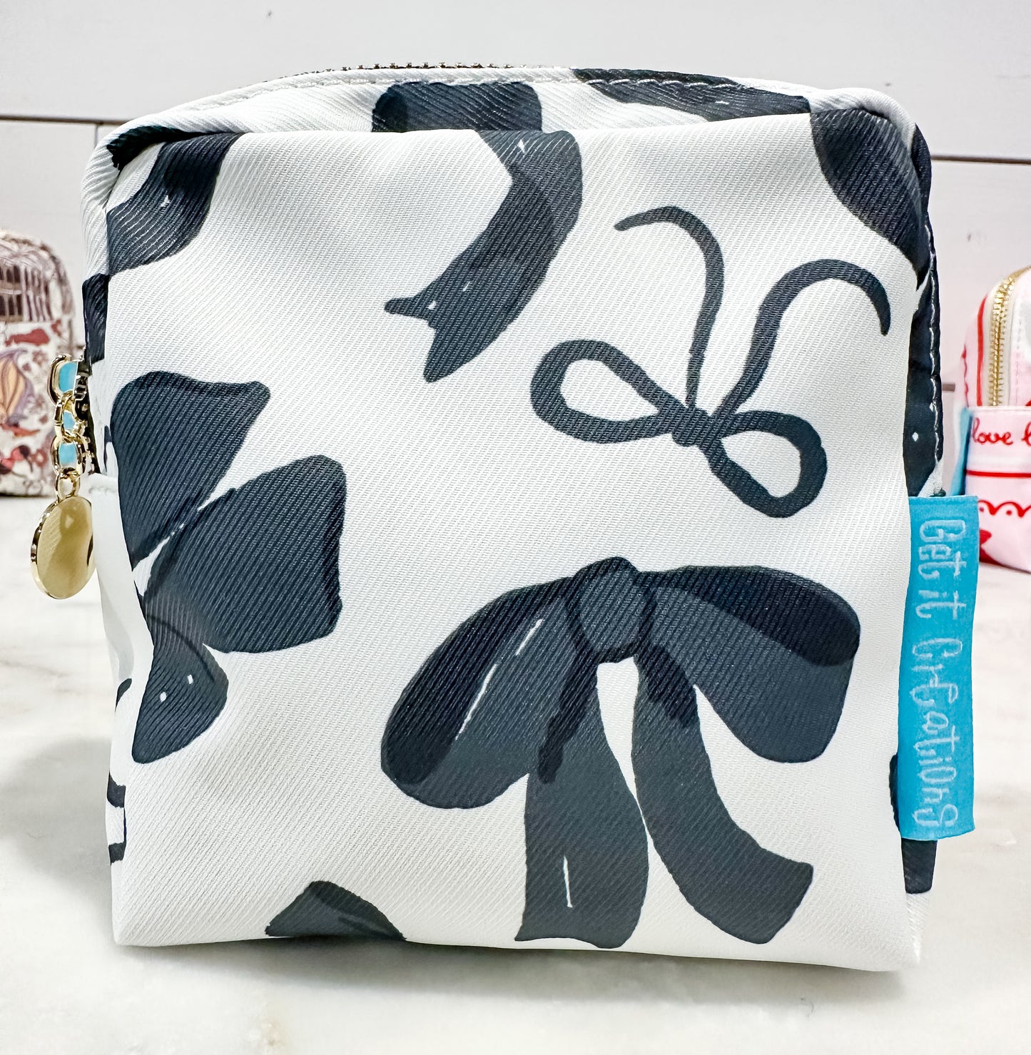 BLACK RIBBONS MINI POUCH